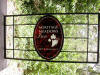 Leaded beveled glass and etched flashed glass transom.