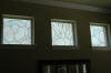 Leaded clear textured glass panels with fused parts.