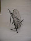 Fused glass bowl with steel stand.