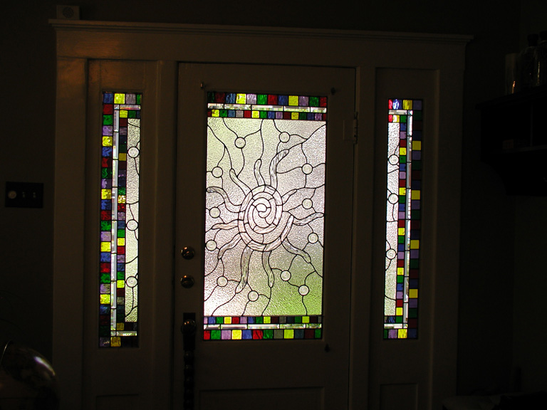Whimsical abstract leaded glass entryway