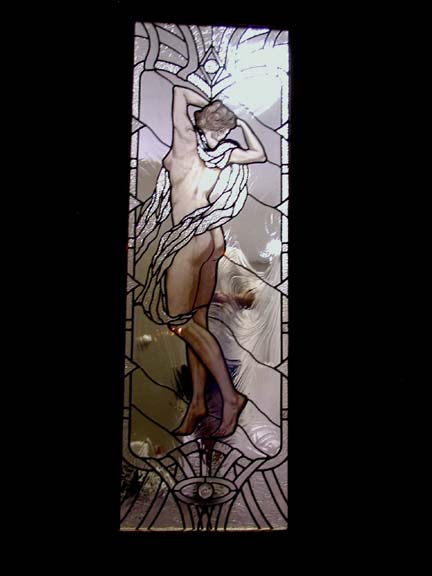 Leaded glass door with figural nude and art deco border