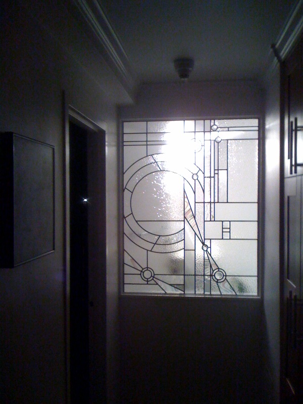 Abstract leaded glass bathroom window and door panels