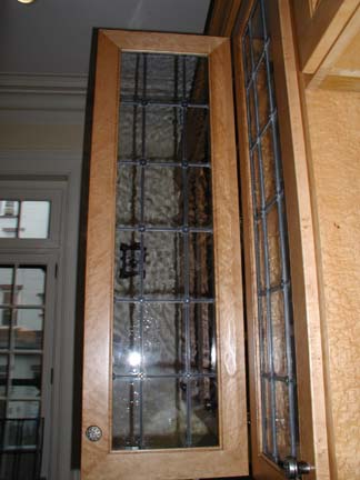 Leaded glass cabinet windows with rosettes