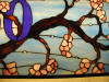 Custom stained glass transom panel with cherry blossoms.