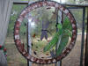 Custom stained glass hanging with swirling dragonflies and photo fused pictures