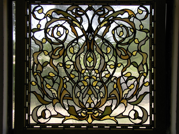 very detailed leaded stained glass transom window