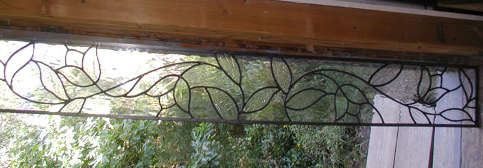 Clear leaded glass flowers and leaves transom window
