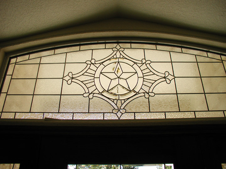 Leaded glass transom window with texas star