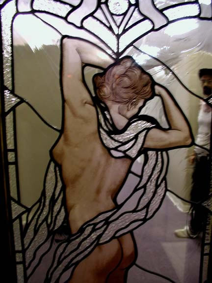 Leaded glass door with figural nude and art deco border