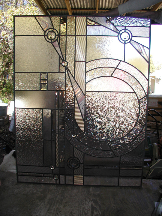 Abstract leaded glass bathroom window and door panels