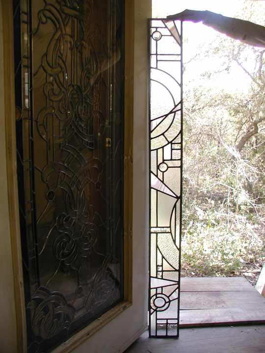 Abstract leaded glass bathroom window and door panels