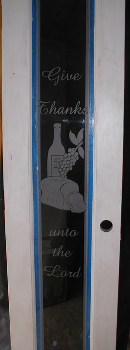custom carved glass, custom etched glass, custom designed etched and carved glass
