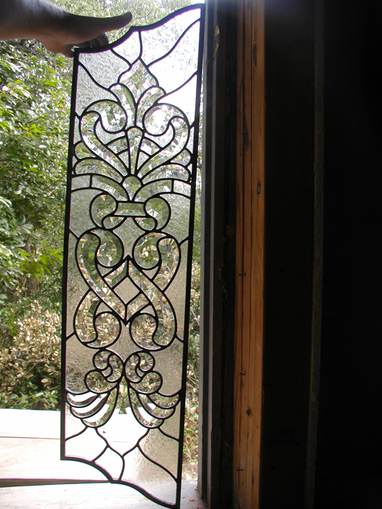 Clear textured and beveled glass door panels