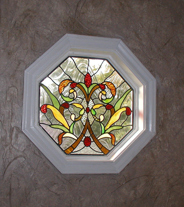 stained glass bathroom window with victorian and art nouveau elements