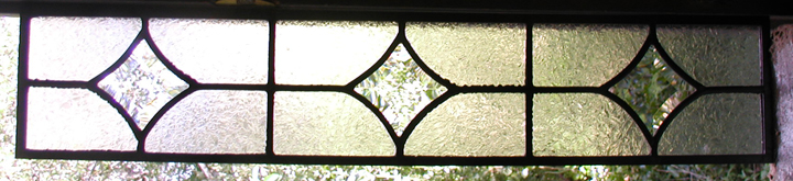 three stars leaded beveled glass window