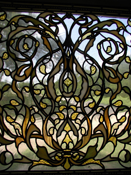 very detailed leaded stained glass transom window