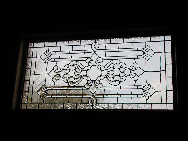 Leaded beveled and clear textured glass transom