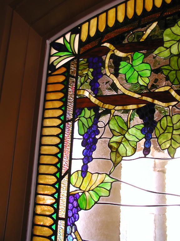 Stained glass grapes with leaded border